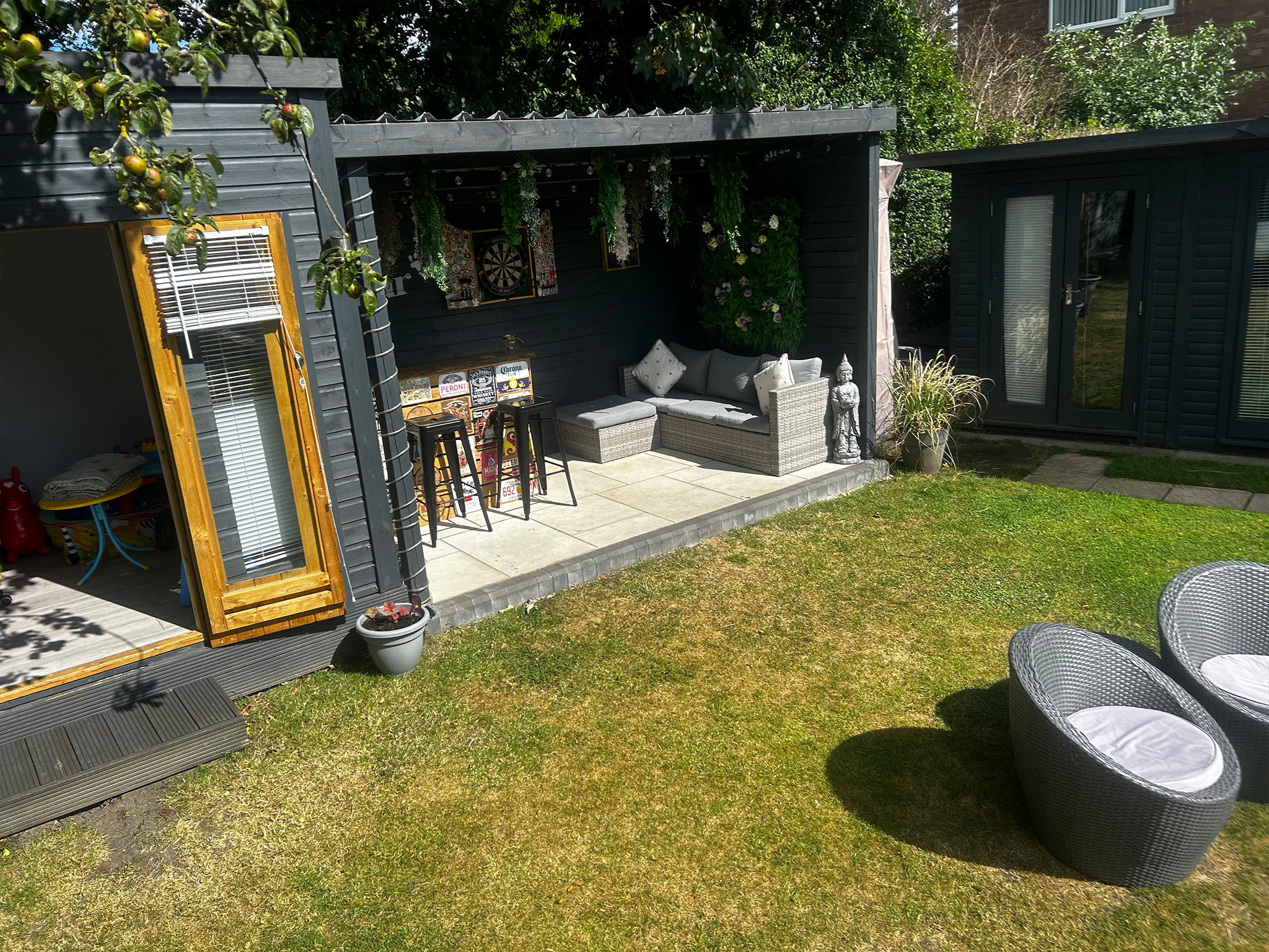 Supreme Resin Drives & Landscaping helped the Dickinson family create a wonderfully landscaped garden with the construction of a 16ftx8ft fully fitted and double glazed outdoor living space